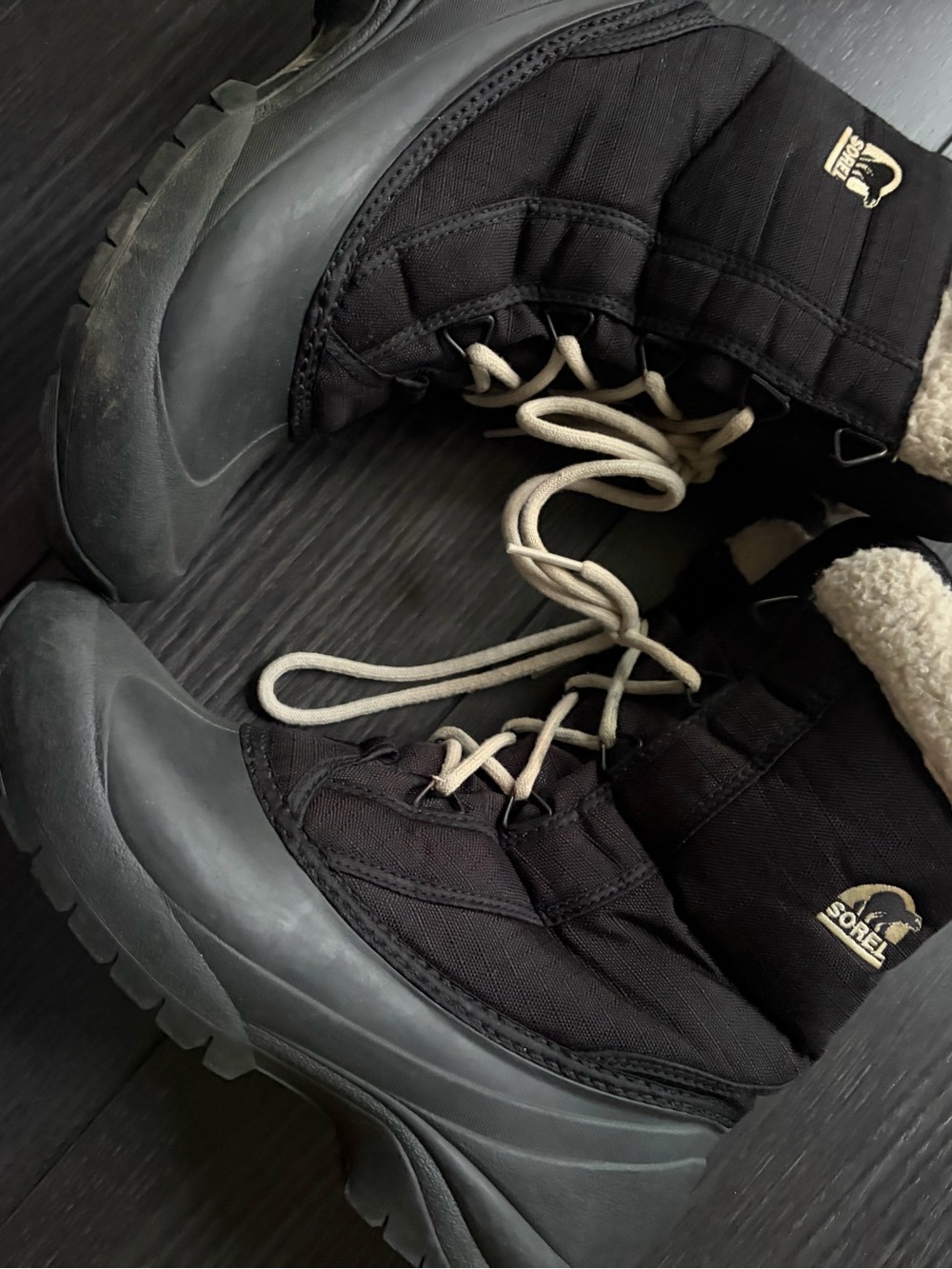 Sorel ladies Black Winter Lace-Up Boots with Cream Laces and plenty of heel wear